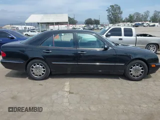2000 Mercedes-Benz E 320 with VIN WDBJF65J4YB121264, listed as a IAAI auction lot 42245628 with 231,799 mi miles and . Bid and sale history available at DreamBid. Image 13.