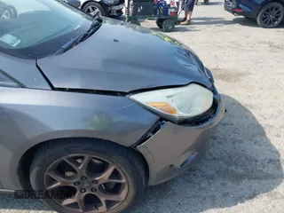 2013 Ford Focus SE with VIN 1FADP3F28DL233822, listed as a IAAI auction lot 42583041 with 135,728 mi miles and . Bid and sale history available at DreamBid. Image 14.