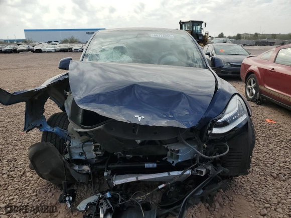 2022 Tesla Model Y Long Range with VIN 7SAYGDEE9NF411810, listed as a Copart auction lot 86772604 with 33,497 mi miles and Salvage Title. Bid and sale history available at carsss.com. Image 5.