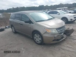 2012 Honda Odyssey LX z VIN 5FNRL5H25CB019912, wystawiony jako IAAI lot #41458224 z przebiegiem 158 980 mil mil oraz . Historia ofert i sprzedaży dostępna na DreamBid. Obrazek 1.