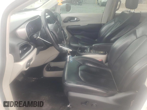 2020 Chrysler Pacifica Touring L with VIN 2C4RC1BG5LR131028, listed as a Copart auction lot 56505555 with 102,972 mi miles and Salvage title. Bid and sale history available at DreamBid. Image 7.