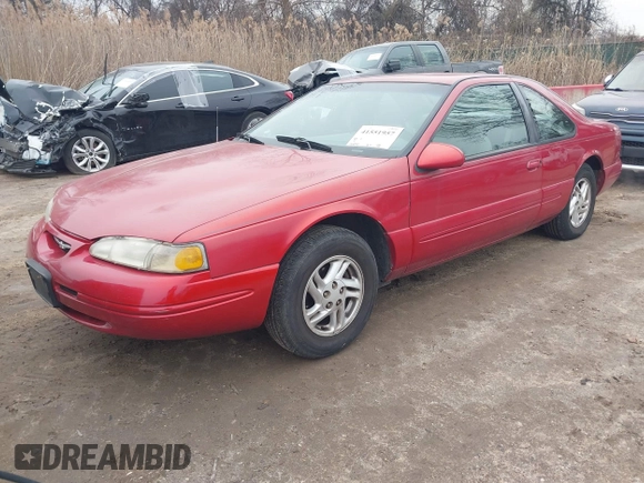 1997 Ford Thunderbird LX with VIN 1FALP6248VH134894, listed as a IAAI auction lot 41551957 with 136,435 mi miles and . Bid and sale history available at DreamBid. Image 2.