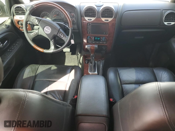 2006 GMC Envoy XL Denali with VIN 1GKES66MX66120332, listed as a Copart auction lot 49632955 with 100,580 mi miles and Salvage Title. Bid and sale history available at carsss.com. Image 8.