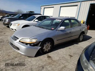 1999 Honda Accord LX with VIN 1HGCG6654XA149161, listed as a Copart auction lot 43411455 with 263,030 mi miles and Salvage title. Bid and sale history available at DreamBid. Image 1.