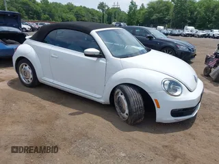 2015 Volkswagen Beetle Classic with VIN 3VW517AT4FM809038, listed as a IAAI auction lot 42621859 with 106,118 mi miles and . Bid and sale history available at DreamBid. Image 1.