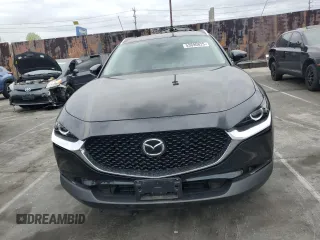 2024 Mazda CX-30 S Carbon Edition z VIN 3MVDMBCM1RM618954, wystawiony jako Copart lot #53690825 z przebiegiem 16 776 mil mil oraz Szkoda całkowita • Salvage title. Historia ofert i sprzedaży dostępna na DreamBid. Obrazek 5.