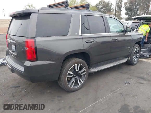 2015 Chevrolet Tahoe LT with VIN 1GNSCBKC1FR233898, listed as a IAAI auction lot 42004048 with 115,779 mi miles and . Bid and sale history available at DreamBid. Image 4.