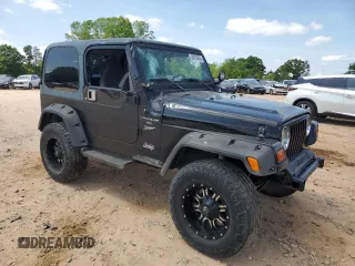 1999 Jeep Wrangler Sport with VIN 1J4FY19S9XP423684, listed as a Copart auction lot 55079455 with 149,756 mi miles and Salvage Title. Bid and sale history available at carsss.com. Image 4.