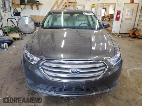 2015 Ford Taurus SEL with VIN 1FAHP2E84FG102318, listed as a Copart auction lot 61744685 with 82,149 mi miles and Salvage title. Bid and sale history available at DreamBid. Image 5.
