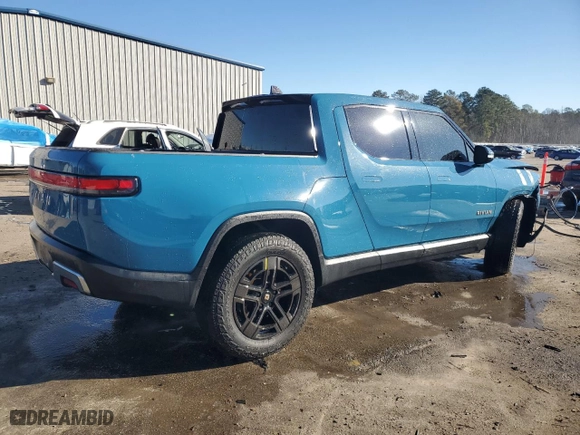2022 Rivian R1T Launch Edition with VIN 7FCTGAAL7NN000539, listed as a Copart auction lot 87811245 with 0 mi miles and Salvage Title. Bid and sale history available at carsss.com. Image 3.