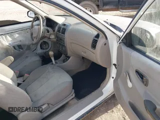 2001 Hyundai Accent GL with VIN KMHCG35C81U090873, listed as a IAAI auction lot 41436739 with 59,359 mi miles. Bid and sale history available at carsss.com. Image 5.