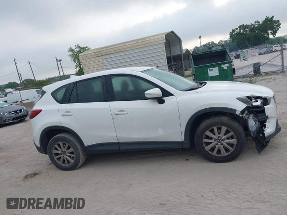 2016 Mazda CX-5 Sport with VIN JM3KE2BY1G0875484, listed as a IAAI auction lot 41838122 with 166,986 mi miles. Bid and sale history available at carsss.com. Image 13.