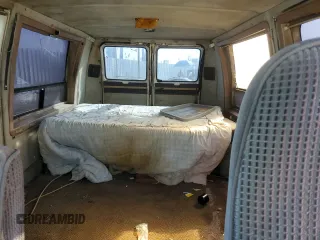 1990 Chevrolet Chevy Van z VIN 1GBEG25K0L7167885, wystawiony jako Copart lot #72575264 z przebiegiem 231 827 mil mil oraz Szkoda całkowita • Salvage title. Historia ofert i sprzedaży dostępna na DreamBid. Obrazek 10.