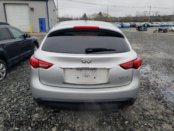 2017 Infiniti QX70 z VIN JN8CS1MW5HM414492, wystawiony jako Copart lot #52415495 z przebiegiem 123 095 mil mil oraz Szkoda całkowita • Salvage title. Historia ofert i sprzedaży dostępna na DreamBid. Obrazek 6.