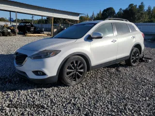 2014 Mazda CX-9 Grand Touring z VIN JM3TB2DAXE0446032, wystawiony jako Copart lot #76730594 z przebiegiem 104 116 mil mil oraz Szkoda całkowita • Salvage title. Historia ofert i sprzedaży dostępna na DreamBid. Obrazek 1.