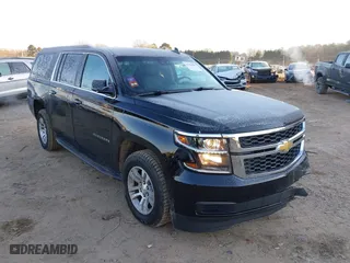2019 Chevrolet Suburban LT with VIN 1GNSKHKCXKR327651, listed as a IAAI auction lot 41352598 with 127,898 mi miles. Bid and sale history available at carsss.com. Image 1.