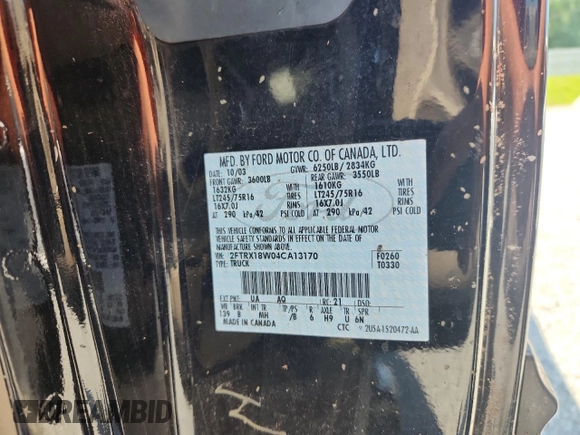 2004 Ford F-150 XL with VIN 2FTRX18W04CA13170, listed as a Copart auction lot 60932775 with 233,249 mi miles and Salvage title. Bid and sale history available at DreamBid. Image 12.