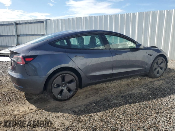 2023 Tesla Model 3 with VIN 5YJ3E1EA4PF613160, listed as a Copart auction lot 62008045 with 23,575 mi miles and Clean title. Bid and sale history available at DreamBid. Image 3.