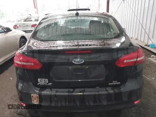 2015 Ford Focus SE with VIN 1FADP3F25FL216205, listed as a IAAI auction lot 42425478 with 124,117 mi miles and . Bid and sale history available at DreamBid. Image 16.