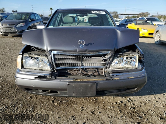 1997 Mercedes-Benz C with VIN WDBHA23E7VF545229, listed as a Copart auction lot 43518335 with 153,158 mi miles and Salvage title. Bid and sale history available at DreamBid. Image 5.