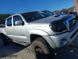 2009 Toyota Tacoma with VIN 5TELU42N09Z596810, listed as a IAAI auction lot 41673552 with 169,044 mi miles. Bid and sale history available at carsss.com. Image 13.