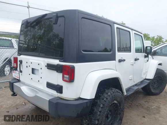 2015 Jeep Wrangler Unlimited Sahara с VIN 1C4BJWEG1FL506393, выставлен на аукционе IAAI как лот 42326900 с пробегом 100 538 миль миль и . История ставок и продаж доступна на DreamBid. Изображение 4.