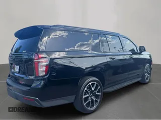 2021 Chevrolet Suburban RST z VIN 1GNSCEKD7MR335410, wystawiony jako Copart lot #59538955 z przebiegiem 184 730 mil mil oraz Czysty tytuł • Clean title. Historia ofert i sprzedaży dostępna na DreamBid. Obrazek 4.