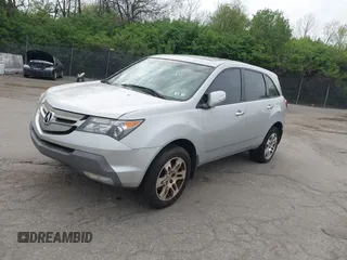 2009 Acura MDX Tech/Entertainment Pkg with VIN 2HNYD28429H523839, listed as a IAAI auction lot 42086231 with 203,211 mi miles. Bid and sale history available at carsss.com. Image 2.