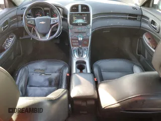 2013 Chevrolet Malibu LTZ with VIN 1G11H5SA6DF199549, listed as a Copart auction lot 49041735 with 130,367 mi miles and Salvage Title. Bid and sale history available at DreamBid. Image 8.