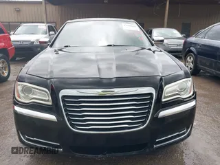 2013 Chrysler 300 with VIN 2C3CCAAG4DH557991, listed as a IAAI auction lot 42398680 with 178,150 mi miles and . Bid and sale history available at DreamBid. Image 6.