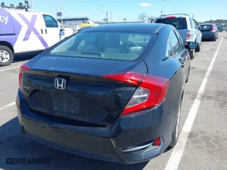 2017 Honda Civic Sedan LX with VIN 2HGFC2F57HH533231, listed as a IAAI auction lot 41897620 with 141,210 mi miles. Bid and sale history available at carsss.com. Image 4.
