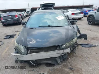 2014 Honda Civic Si z VIN 2HGFB6E58EH704947, wystawiony jako IAAI lot #41958324 z przebiegiem 177 517 mil mil oraz . Historia ofert i sprzedaży dostępna na DreamBid. Obrazek 13.