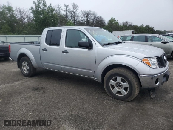 2007 Nissan Frontier SE with VIN 1N6AD09W97C423634, listed as a Copart auction lot 60997335 with 161,871 mi miles and Salvage title. Bid and sale history available at DreamBid. Image 4.