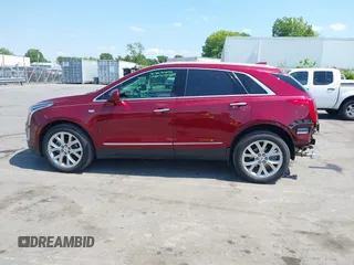 2017 Cadillac XT5 Luxury FWD z VIN 1GYKNBRS3HZ293677, wystawiony jako IAAI lot #42043025 z przebiegiem 89 975 mil mil oraz . Historia ofert i sprzedaży dostępna na DreamBid. Obrazek 14.