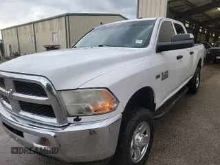 2015 Ram 2500 Tradesman z VIN 3C6TR5CT5FG664005, wystawiony jako IAAI lot #42556122 z przebiegiem 183 397 mil mil oraz . Historia ofert i sprzedaży dostępna na DreamBid. Obrazek 4.