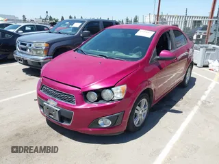2014 Chevrolet Sonic LT with VIN 1G1JC5SH7E4121869, listed as a IAAI auction lot 42204925 with 122,394 mi miles and . Bid and sale history available at DreamBid. Image 2.