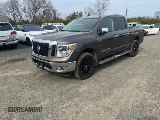 2019 Nissan Titan SV z VIN 1N6AA1E59KN510703, wystawiony jako Copart lot #51878095 z przebiegiem 147 669 mil mil oraz Czysty tytuł • Clean title. Historia ofert i sprzedaży dostępna na DreamBid. Obrazek 1.