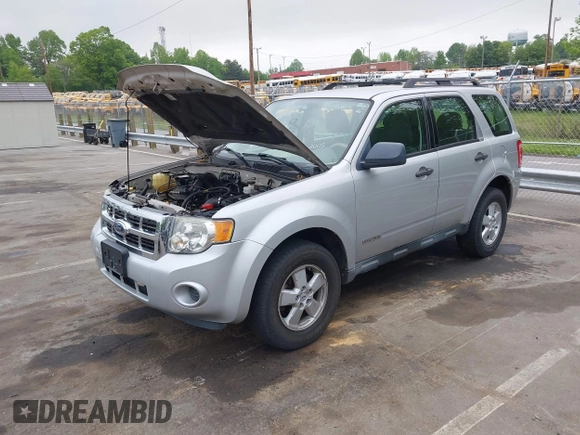 2008 Ford Escape XLS z VIN 1FMCU02Z68KE51829, wystawiony jako IAAI lot #42093869 z przebiegiem 205 151 mil mil oraz . Historia ofert i sprzedaży dostępna na DreamBid. Obrazek 2.