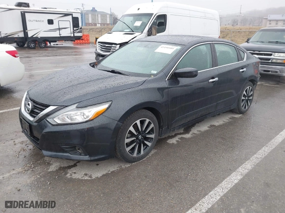 2018 Nissan Altima 2.5 SR with VIN 1N4AL3AP3JC165989, listed as a IAAI auction lot 41490589 with 84,879 mi miles. Bid and sale history available at carsss.com. Image 2.