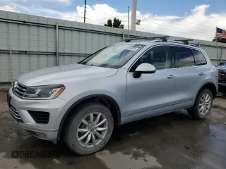 2016 Volkswagen Touareg Sport with VIN WVGEF9BP0GD009332, listed as a Copart auction lot 60335055 with 179,590 mi miles and Salvage title. Bid and sale history available at DreamBid. Image 1.