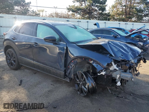 2023 Mazda CX-30 Premium Plus with VIN 3MVDMBEY9PM557107, listed as a Copart auction lot 46893065 with 10,404 mi miles and Salvage title. Bid and sale history available at DreamBid. Image 4.