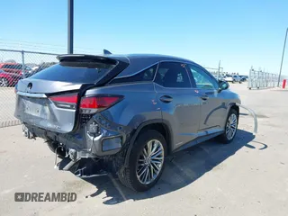 2020 Lexus RX 450h with VIN 2T2JGMDA2LC053394, listed as a IAAI auction lot 41979007 with 56,331 mi miles and . Bid and sale history available at DreamBid. Image 4.