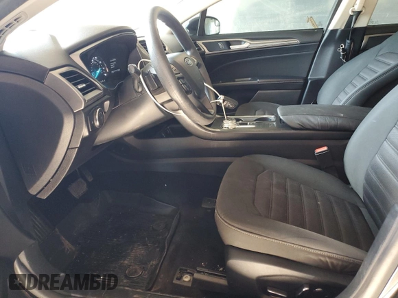 2018 Ford Fusion SE z VIN 3FA6P0HDXJR130677, wystawiony jako Copart lot #51737345 z przebiegiem 129 918 mil mil oraz Szkoda całkowita • Salvage title. Historia ofert i sprzedaży dostępna na DreamBid. Obrazek 7.