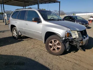 2004 GMC Envoy SLE z VIN 1GKDS13S842182799, wystawiony jako Copart lot #55553774 z przebiegiem 216 710 mil mil oraz Szkoda całkowita • Salvage title. Historia ofert i sprzedaży dostępna na DreamBid. Obrazek 4.