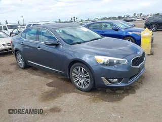 2014 Kia Cadenza Premium z VIN KNALN4D77E5145153, wystawiony jako IAAI lot #42265439 z przebiegiem 65 154 mil mil oraz . Historia ofert i sprzedaży dostępna na DreamBid. Obrazek 1.