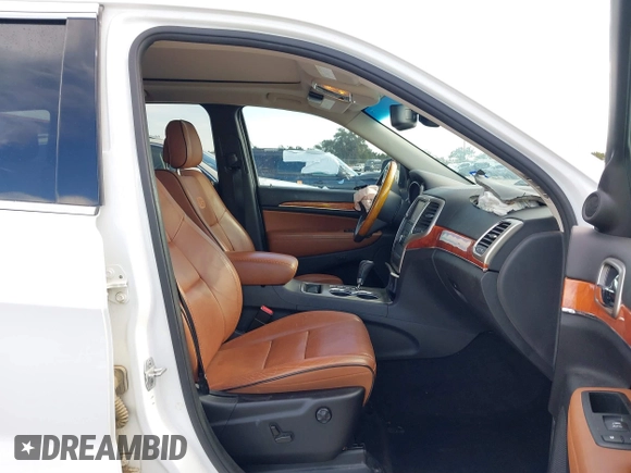 2013 Jeep Grand Cherokee Overland with VIN 1C4RJECT6DC533434, listed as a IAAI auction lot 41656116 with 122,809 mi miles. Bid and sale history available at carsss.com. Image 5.