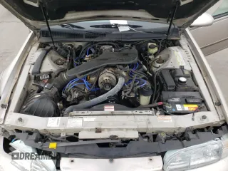 1995 Ford Thunderbird LX with VIN 1FALP62W45H169199, listed as a Copart auction lot 65458964 with 111,726 mi miles and Salvage Title. Bid and sale history available at DreamBid. Image 13.