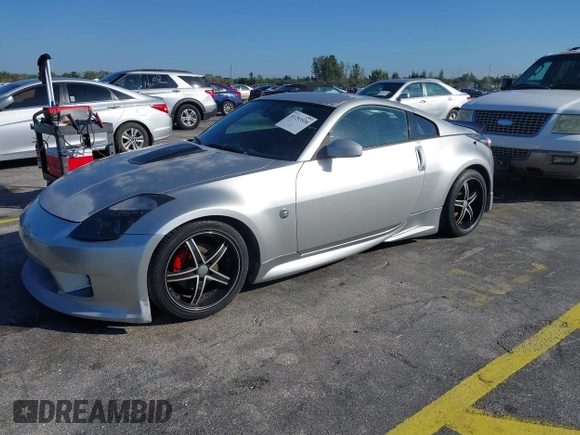 2003 Nissan 350Z Touring z VIN JN1AZ34E23T019866, wystawiony jako IAAI lot #41293510 z przebiegiem 118 416 mil mil oraz . Historia ofert i sprzedaży dostępna na DreamBid. Obrazek 2.
