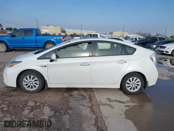 2012 Toyota Prius z VIN JTDKN3DP3C3012388, wystawiony jako IAAI lot #42436517 z przebiegiem 196 072 mil mil oraz . Historia ofert i sprzedaży dostępna na DreamBid. Obrazek 14.
