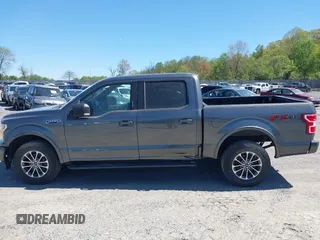 2018 Ford F-150 XL with VIN 1FTEW1EG2JFE55513, listed as a IAAI auction lot 41530354 with 132,617 mi miles. Bid and sale history available at carsss.com. Image 14.